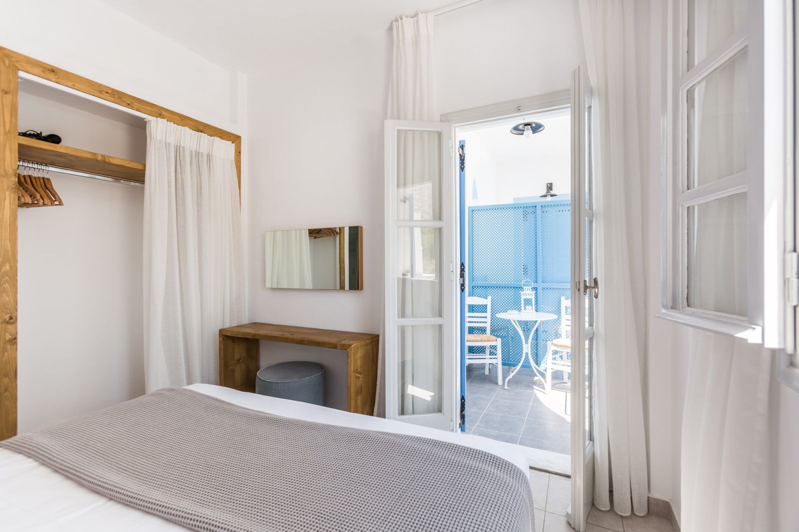 Bedroom opening onto a private balcony