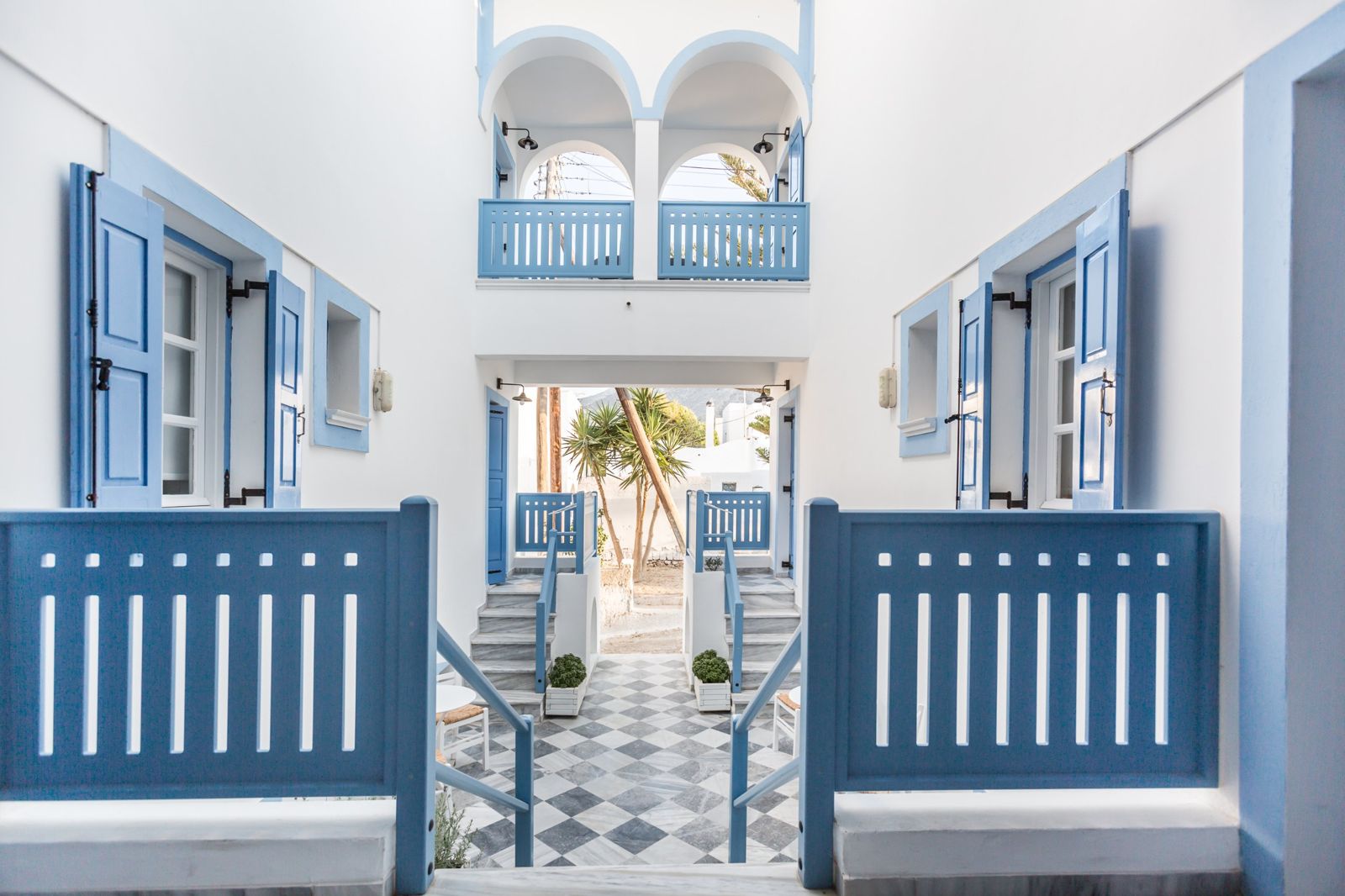 View through the courtyard to the entrance of Fanouris Condo